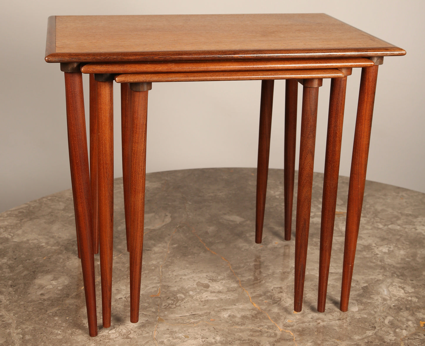 A nest of three midcentury side table sliding rail (Denmark)