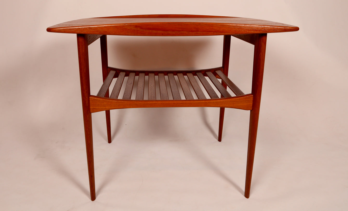 A Tove and Edvard Kindt Larsen Teak Side Table with magazine rack (1950s) Denmark