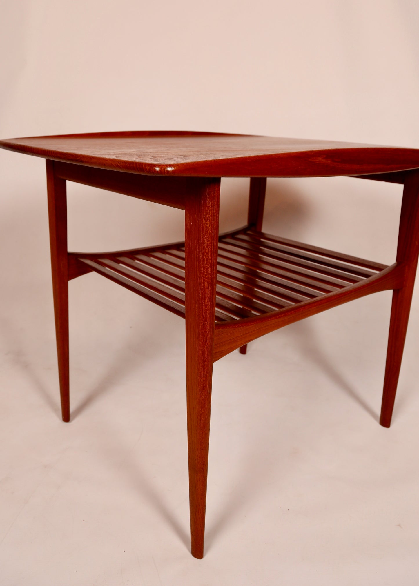 A Tove and Edvard Kindt Larsen Teak Side Table with magazine rack (1950s) Denmark