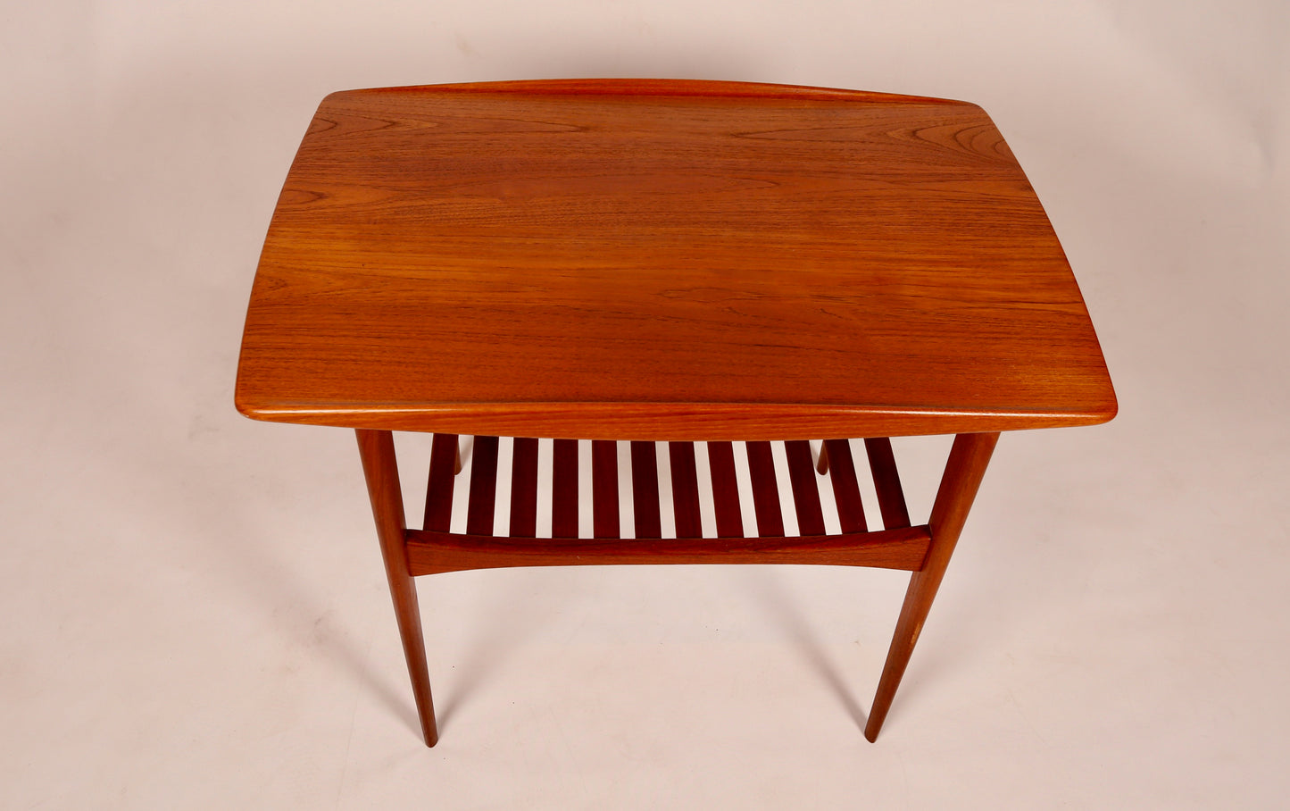 A Tove and Edvard Kindt Larsen Teak Side Table with magazine rack (1950s) Denmark