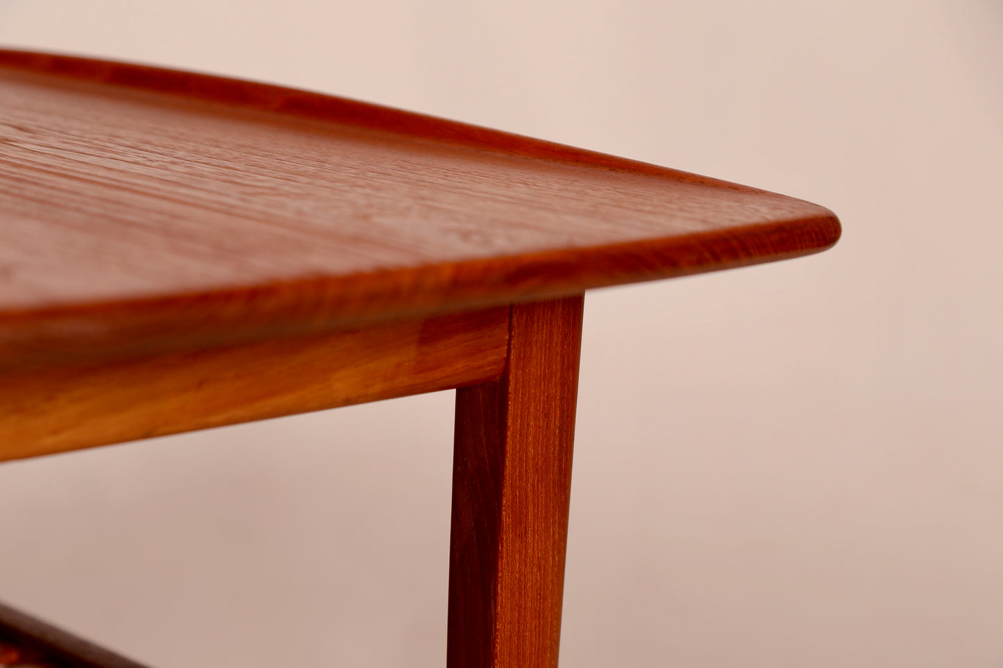 A Tove and Edvard Kindt Larsen Teak Side Table with magazine rack (1950s) Denmark