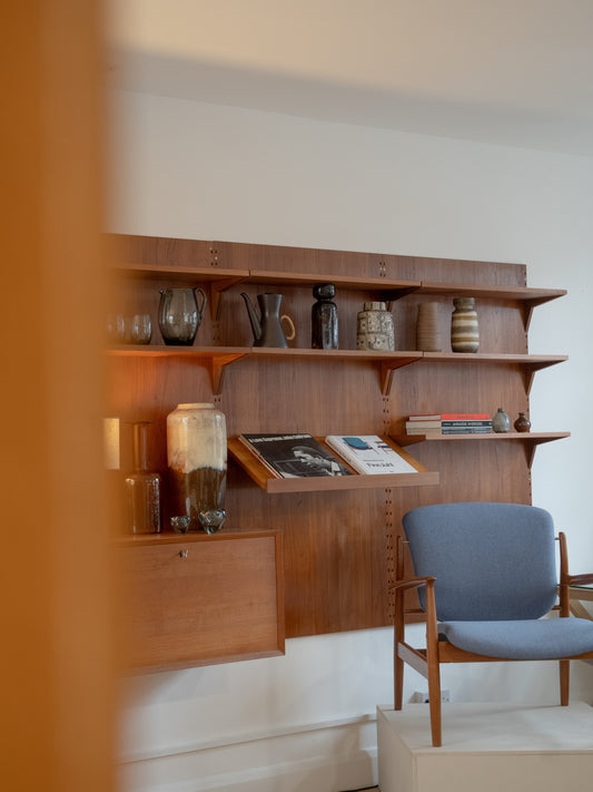 Two iconic wall units.  One legendary designer.
