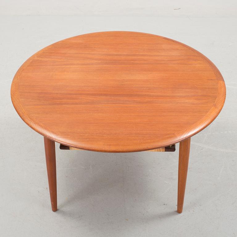 Circular teak and wicker coffee table w by Johannes Andersen (1960s)