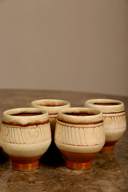 Celtic Pottery decanter with tray and 4 beakers in 'Medallion' design (1960s) Cornwall