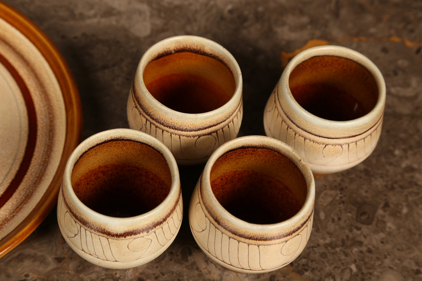 Celtic Pottery decanter with tray and 4 beakers in 'Medallion' design (1960s) Cornwall