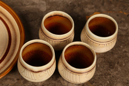 Celtic Pottery decanter with tray and 4 beakers in 'Medallion' design (1960s) Cornwall