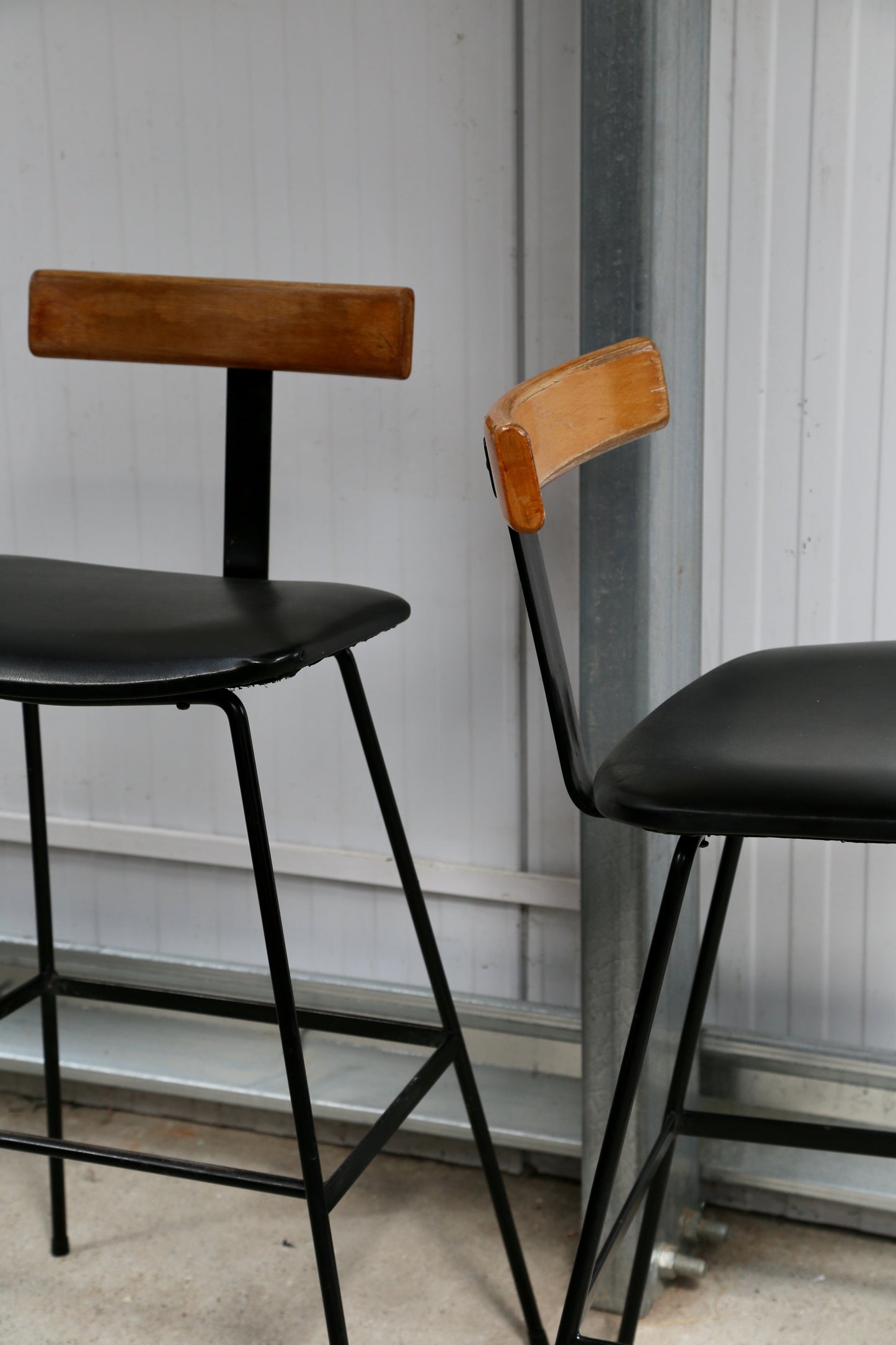 Pair of Black 'Program' Chairs by Frank Guille for Kandya, (1950s) UK
