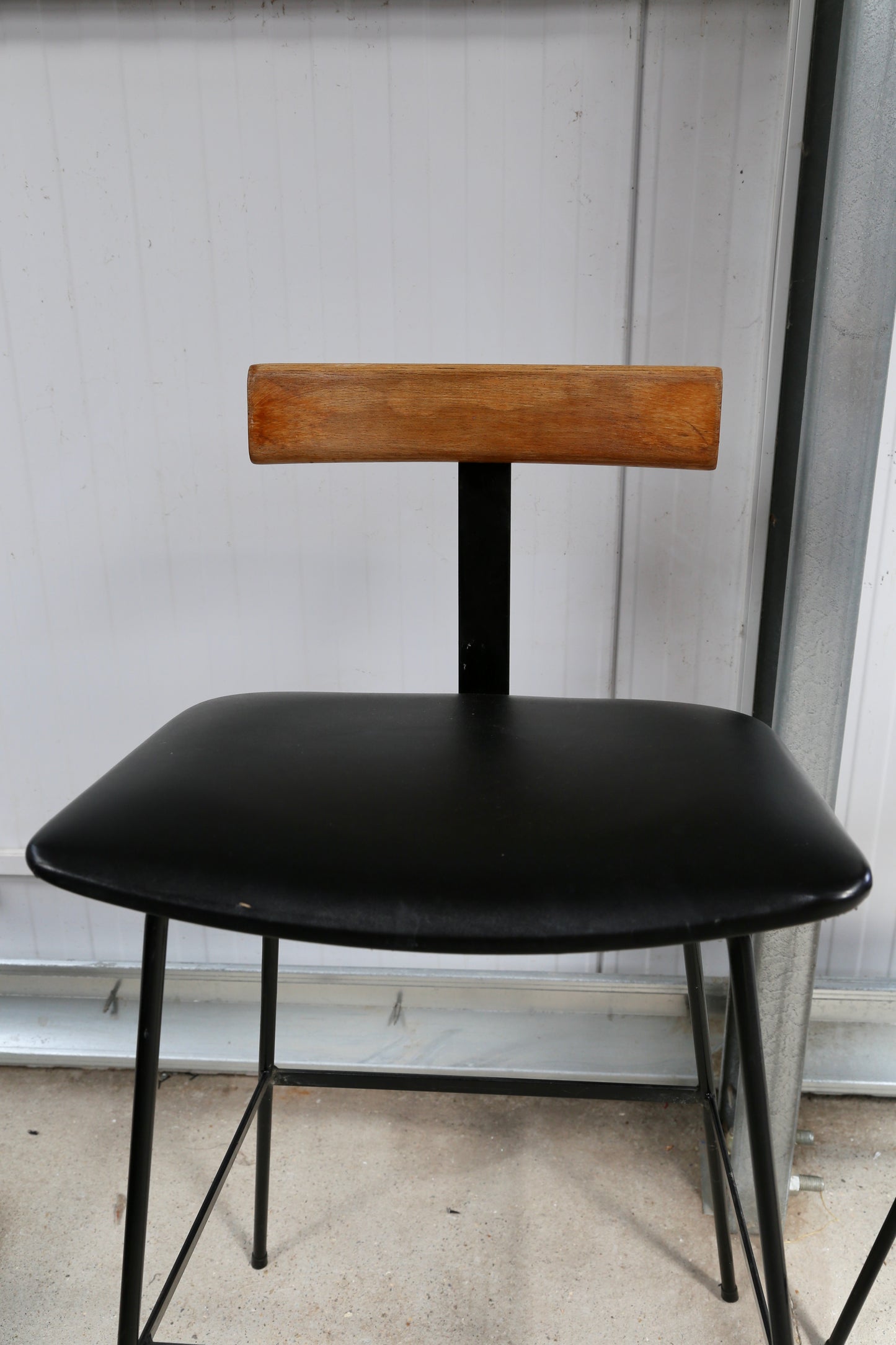 Pair of Black 'Program' Chairs by Frank Guille for Kandya, (1950s) UK